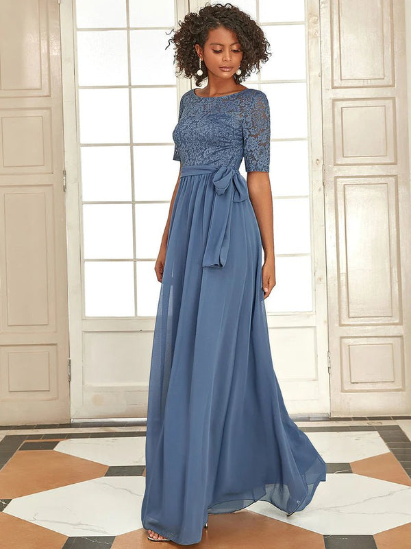 https://www.calabro.com.au/cdn/shop/products/high-neck-lace-short-sleeve-flowy-mother-of-the-bride-dress-730532_800x800.webp?v=1693559772